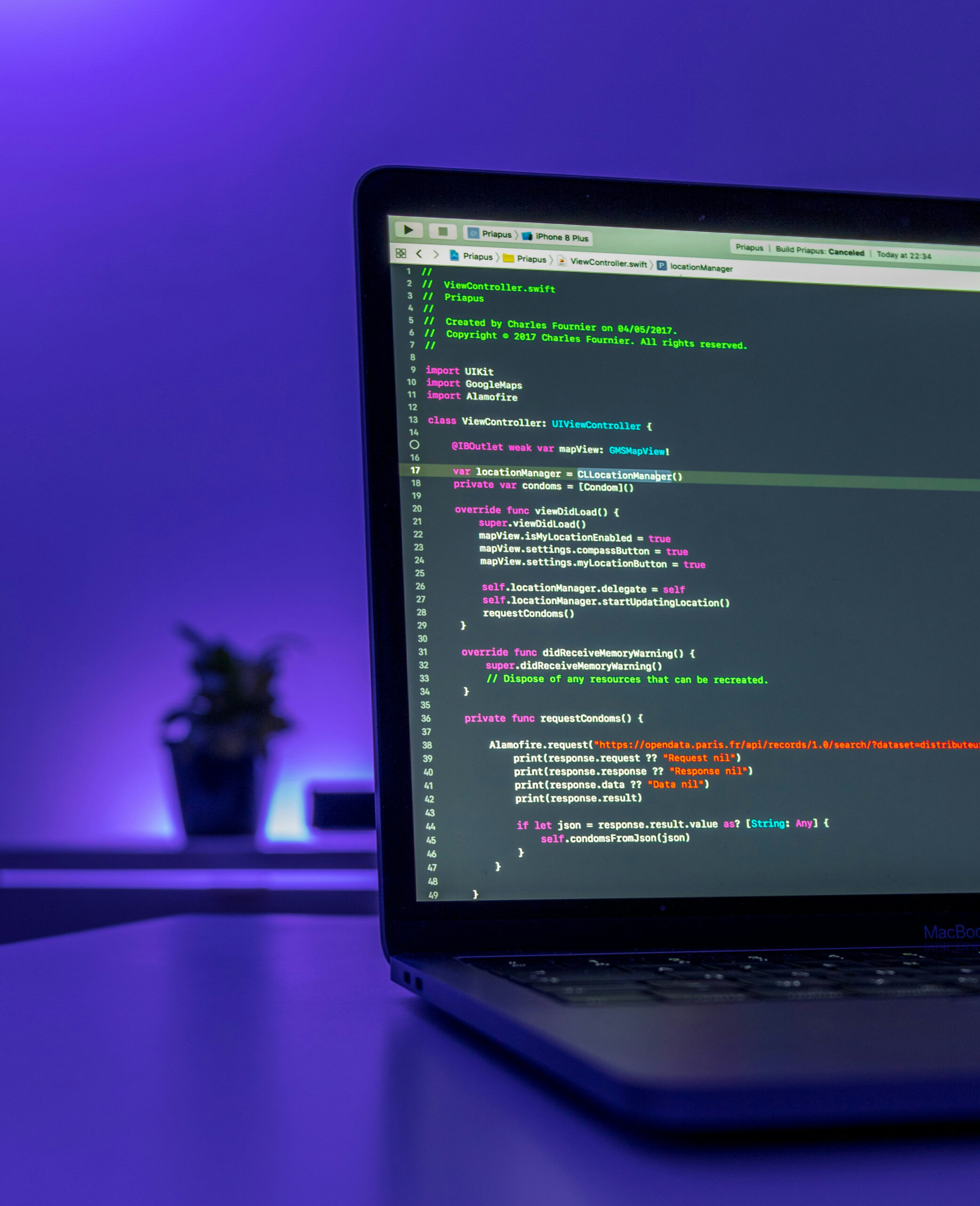 MacBook with code on screen